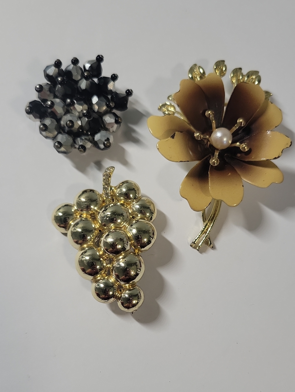 Gold Tone Floral and Grape Cluster Brooch Lot